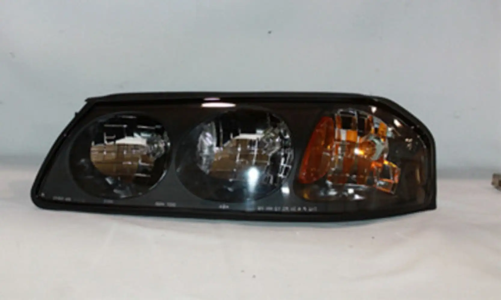 TYC 20-5772-90 Chevrolet Impala Driver Side Headlight Assembly Fits 2004 Chevrolet Impala