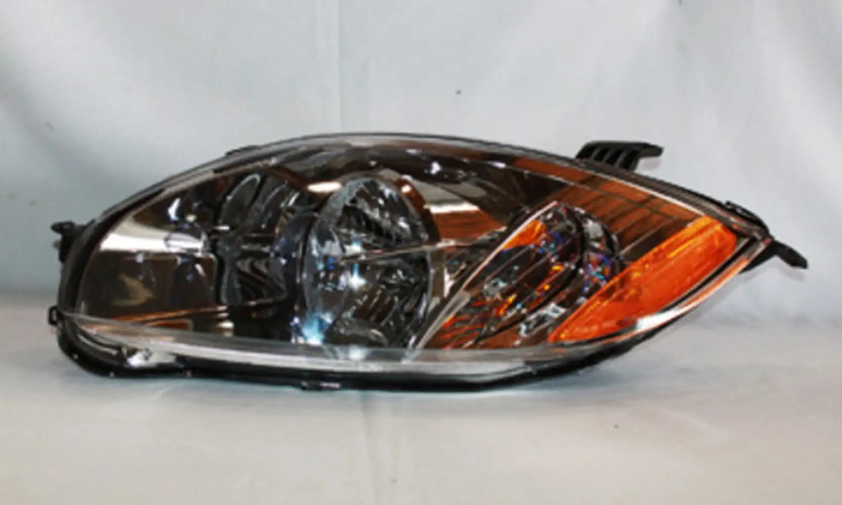 TYC 20-6722-00 Mitsubishi Eclipse Driver Side Headlight Assembly Fits 2007 Mitsubishi Eclipse