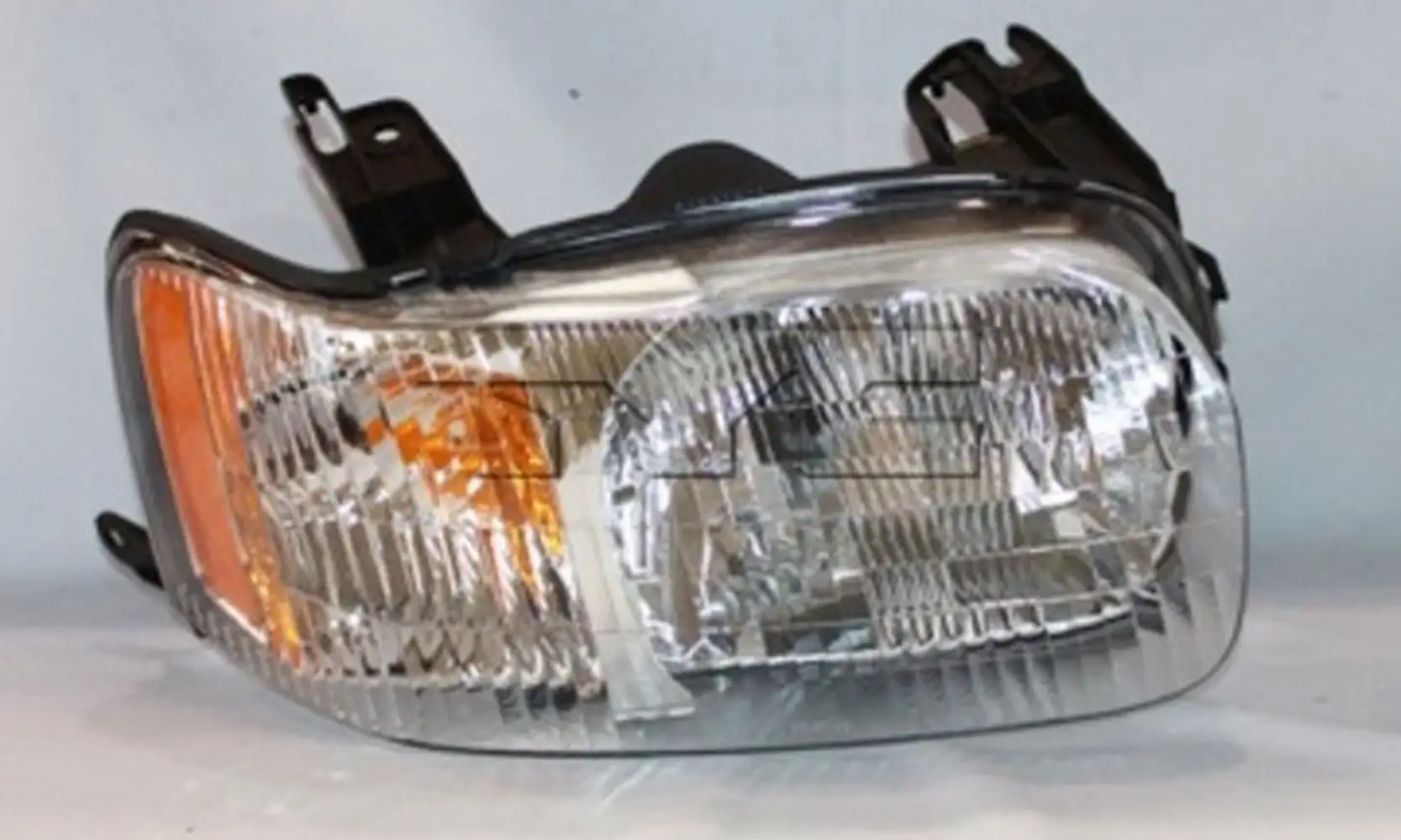 TYC Headlight Assembly Fits 2003 Ford Escape