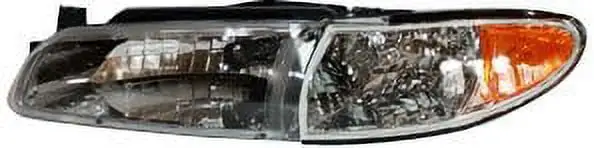 TYC Headlight Assembly Fits select: 1997-2003 PONTIAC GRAND PRIX